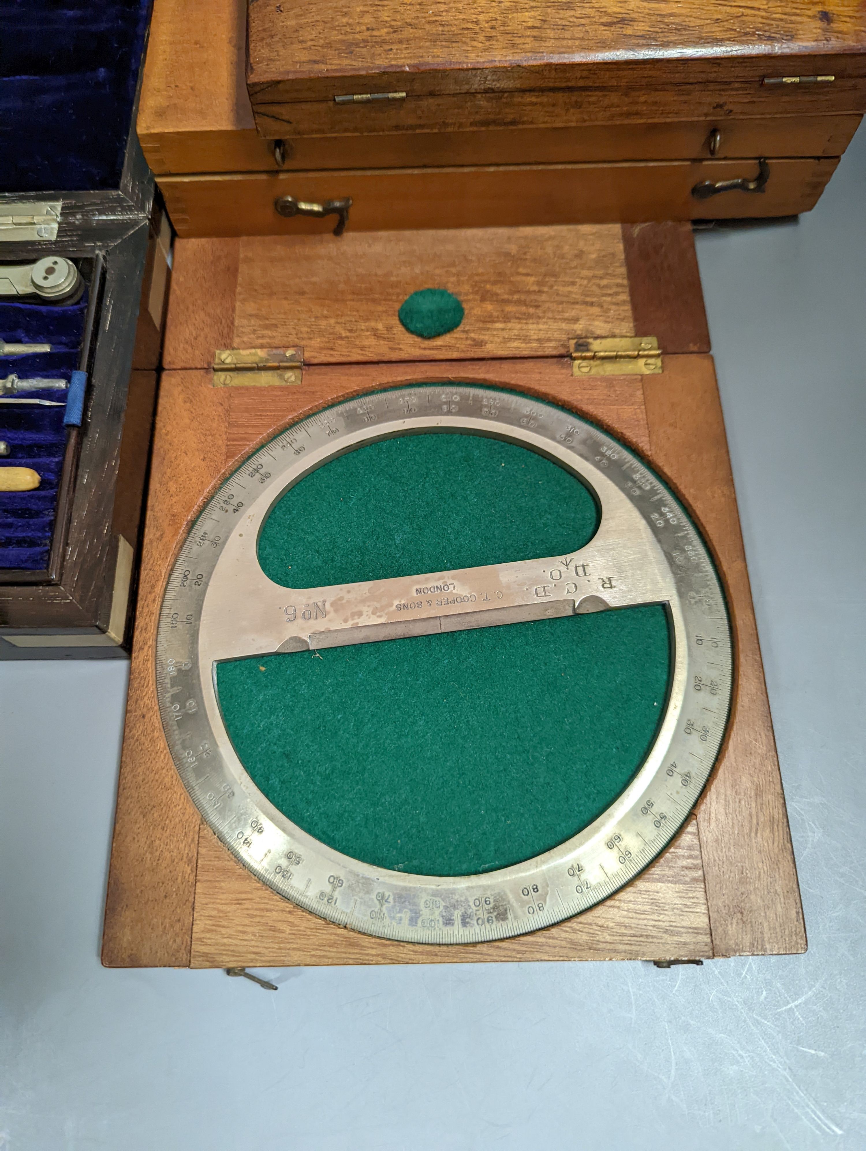 A collection of mahogany cased drawing instruments (8)